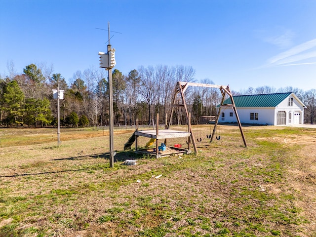 view of playground with a yard