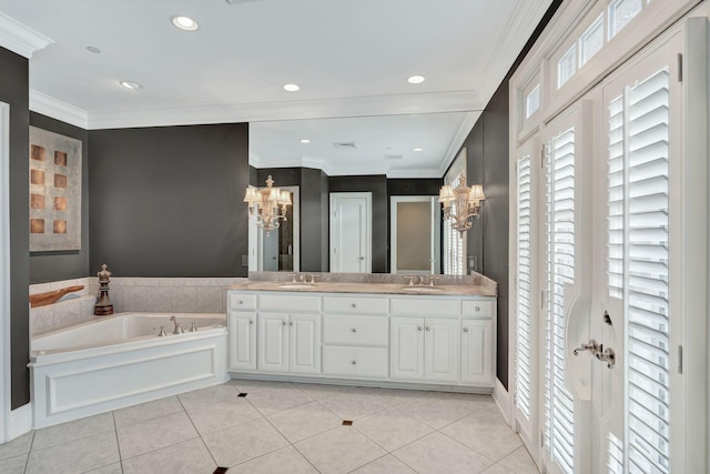 bathroom with a garden tub, ornamental molding, double vanity, tile patterned floors, and a sink