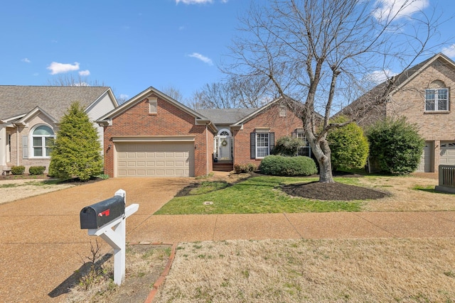 view of front facade featuring brick siding, an attached garage, concrete driveway, and a front lawn