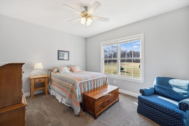 bedroom featuring carpet, baseboards, and ceiling fan