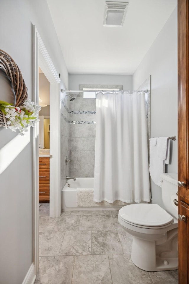 bathroom featuring visible vents, shower / bathtub combination with curtain, toilet, and vanity