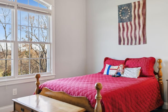 bedroom with multiple windows