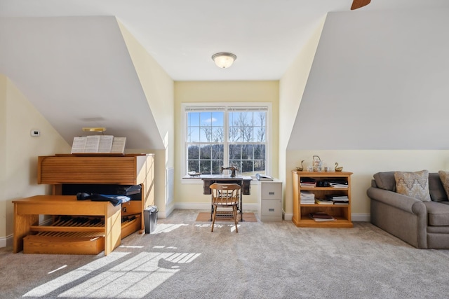 sitting room with baseboards and carpet