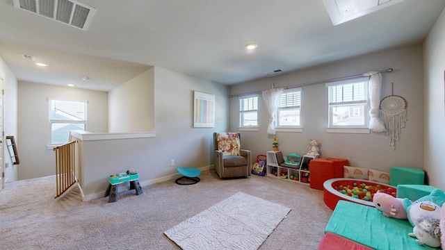 rec room with recessed lighting, carpet flooring, baseboards, and visible vents