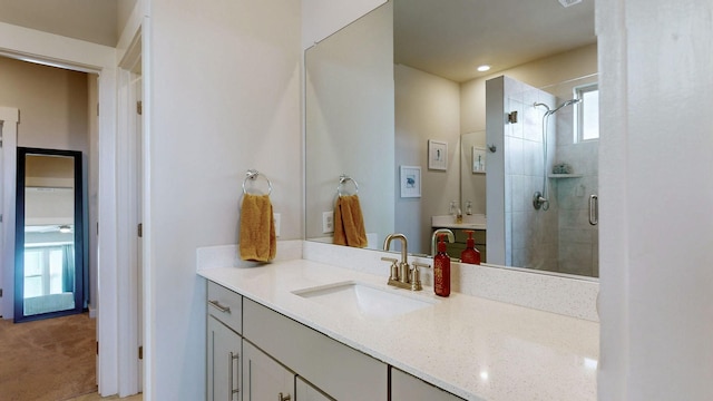 full bathroom featuring vanity and a shower stall