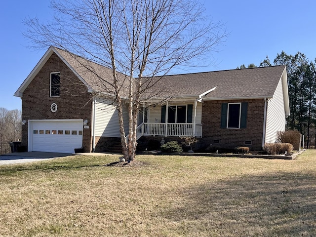 single story home featuring crawl space, covered porch, a front yard, and brick siding