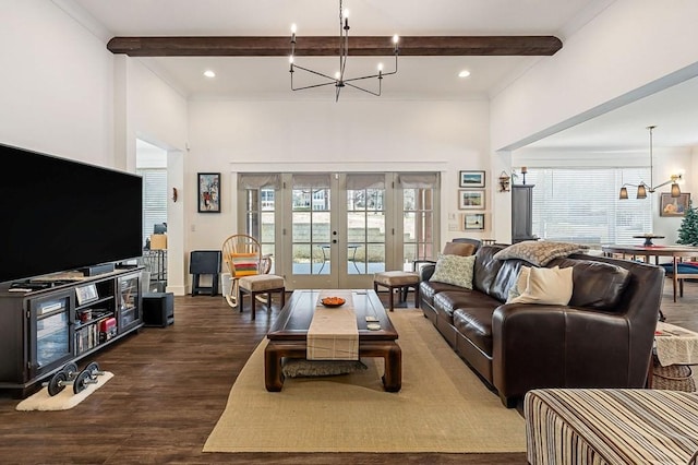 living room featuring an inviting chandelier, plenty of natural light, dark wood-style flooring, french doors, and beamed ceiling