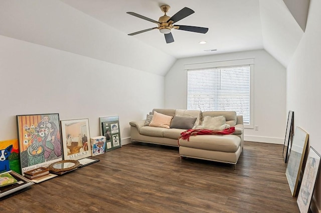 living area featuring ceiling fan, dark wood-type flooring, baseboards, and vaulted ceiling