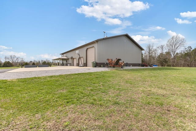 view of property exterior featuring an outdoor structure and a yard