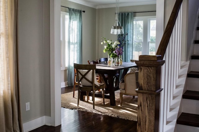 dining room with stairs, dark wood-style floors, baseboards, and ornamental molding