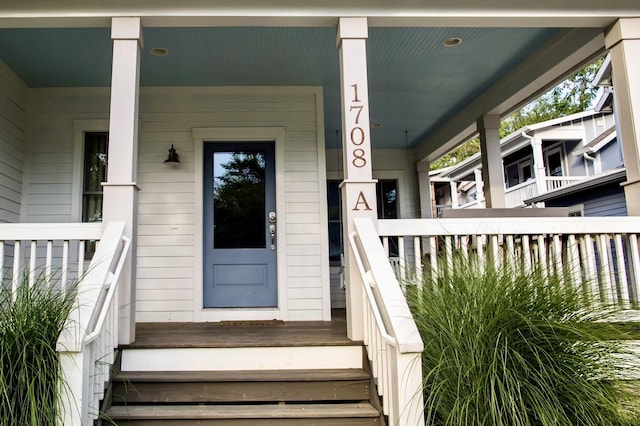 doorway to property with a porch