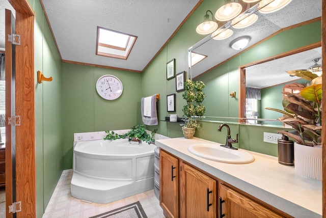 full bath featuring tile patterned floors, a skylight, crown molding, and a bath