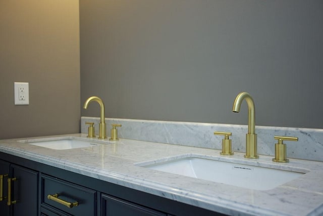 bathroom featuring double vanity and a sink