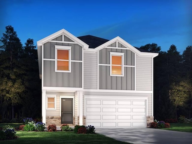 view of front of property with driveway, stone siding, board and batten siding, a front yard, and a garage