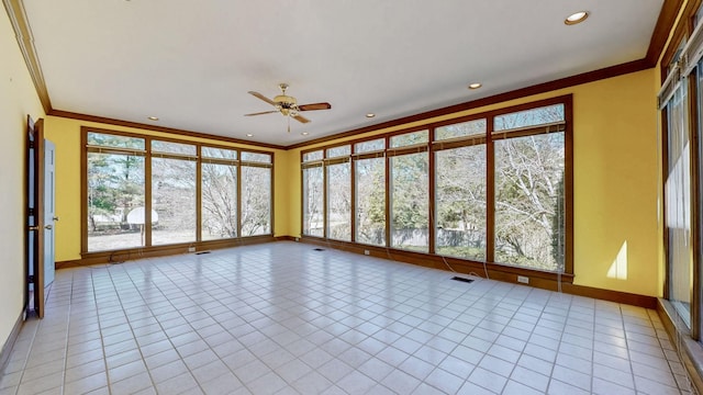 unfurnished sunroom with visible vents and ceiling fan