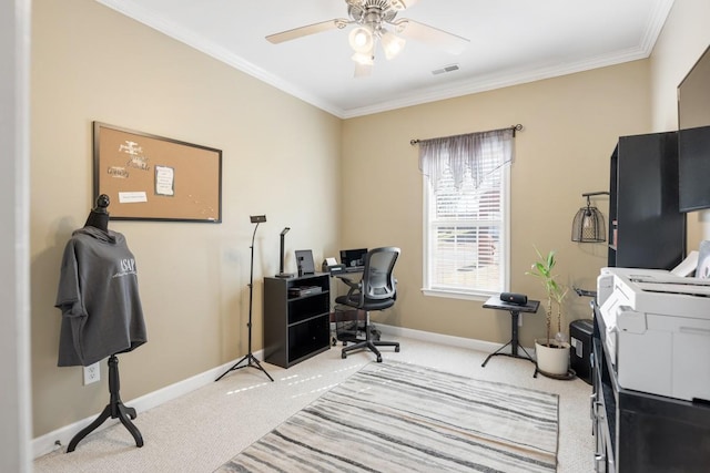 home office with ceiling fan, visible vents, crown molding, and light carpet
