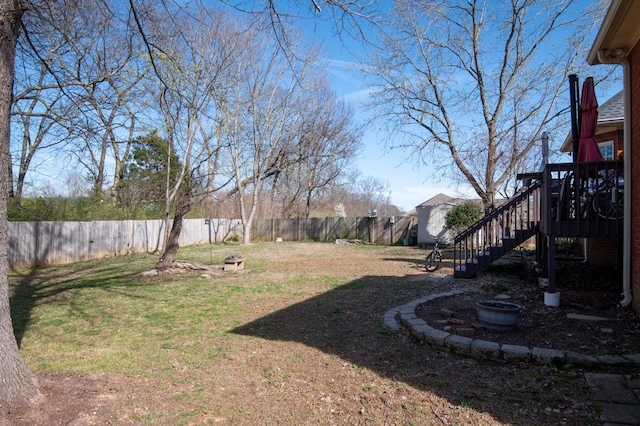 view of yard featuring a fenced backyard