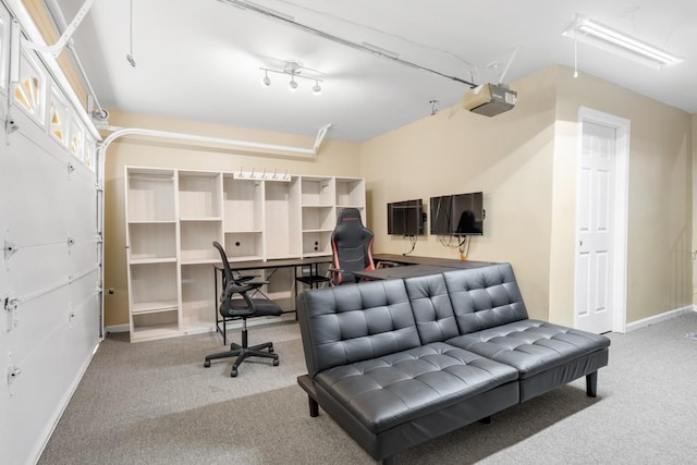 office area with attic access, baseboards, and carpet