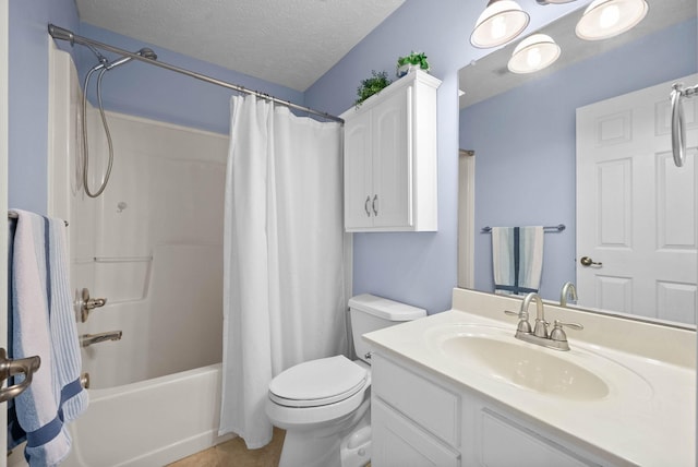 bathroom with shower / bathtub combination with curtain, a textured ceiling, vanity, and toilet