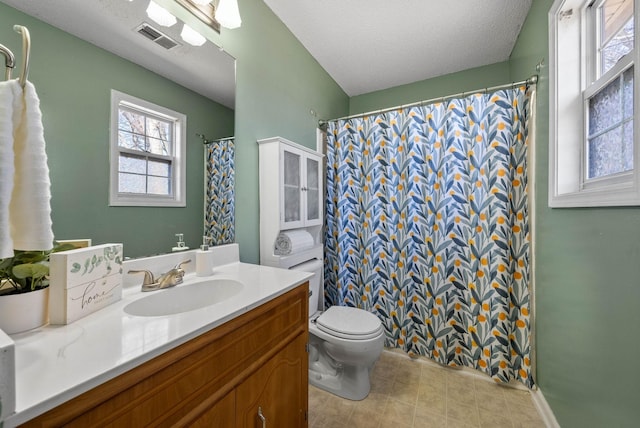 full bathroom with vanity, a shower with curtain, visible vents, a textured ceiling, and toilet