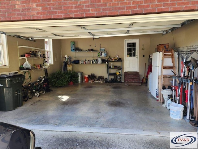 garage featuring freestanding refrigerator