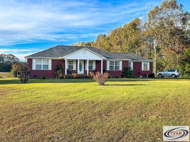 ranch-style house featuring crawl space, brick siding, and a front lawn