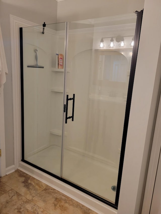 full bath featuring a shower stall