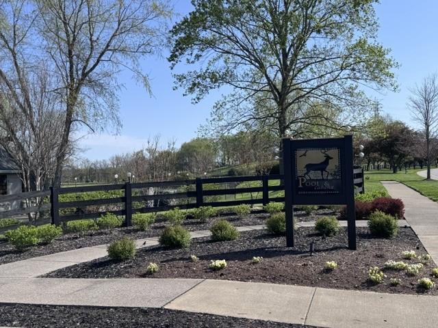 view of gate featuring fence
