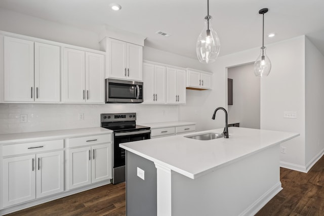 kitchen with a sink, dark wood-style floors, white cabinetry, and stainless steel appliances