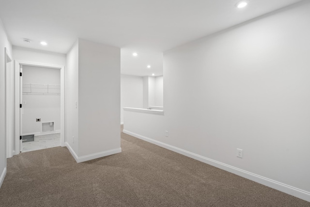 interior space with visible vents, recessed lighting, carpet, and baseboards