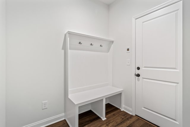 mudroom with baseboards and dark wood finished floors