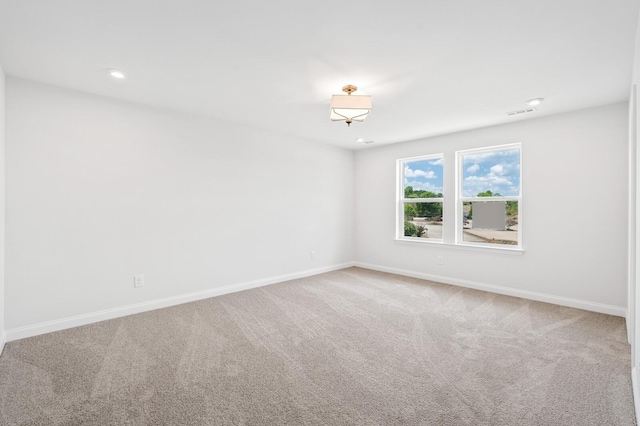 unfurnished room featuring carpet flooring, recessed lighting, and baseboards