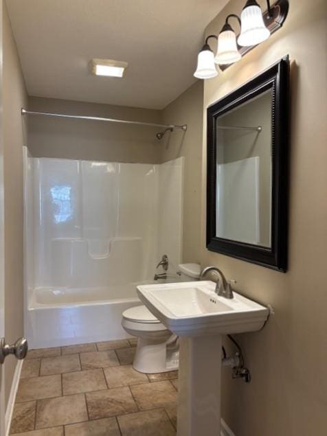 full bathroom with toilet and bathing tub / shower combination