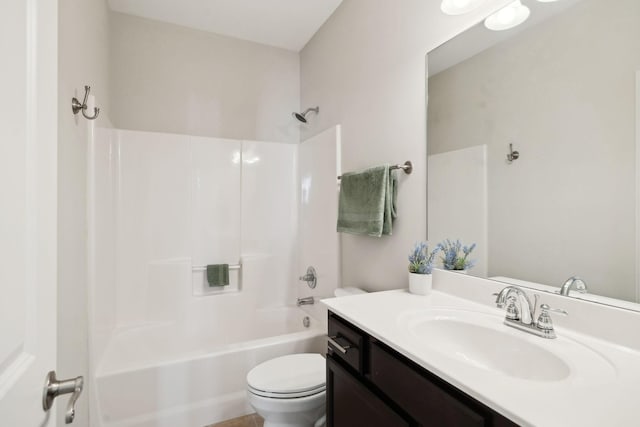 full bathroom with vanity, shower / tub combination, and toilet