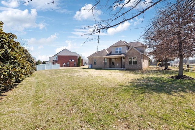 view of yard with fence