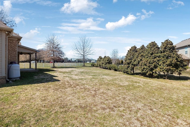 view of yard featuring fence