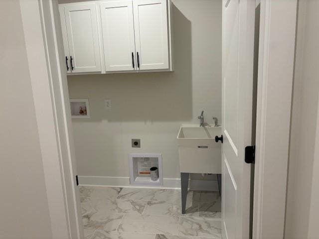 laundry room with marble finish floor, cabinet space, baseboards, hookup for an electric dryer, and hookup for a washing machine