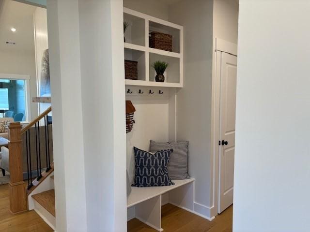 mudroom with wood finished floors