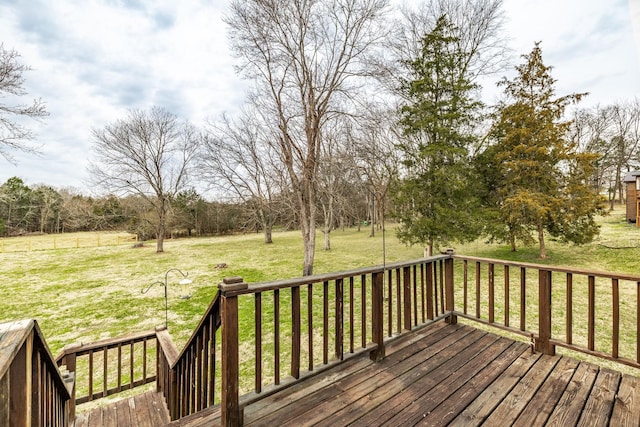 wooden deck with a yard