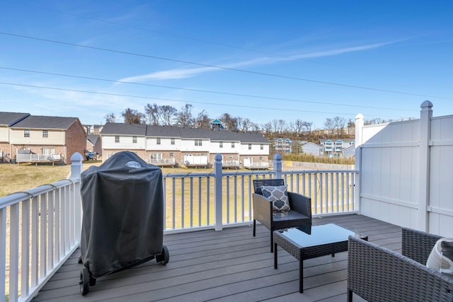 deck featuring a residential view and area for grilling