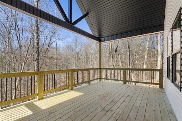 deck featuring a forest view