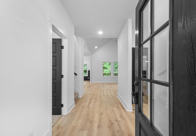4410 Shiloh Canaan Rd, Palmyra, TN 37142 - corridor with light wood-type flooring, baseboards, vaulted ceiling, and recessed lighting