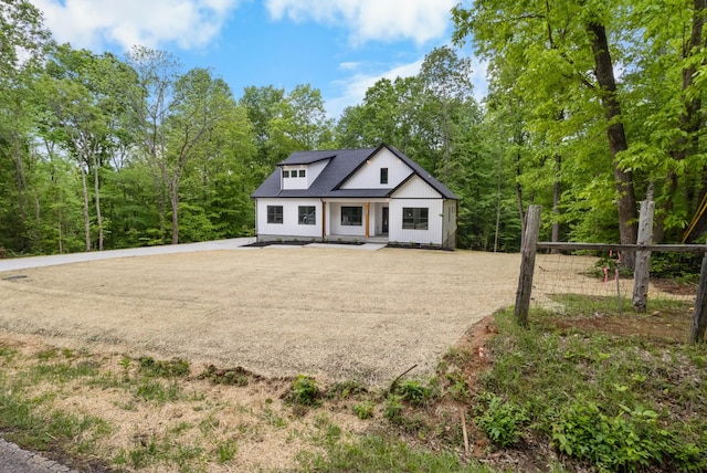 4410 Shiloh Canaan Rd, Palmyra, TN 37142 - view of modern farmhouse style home