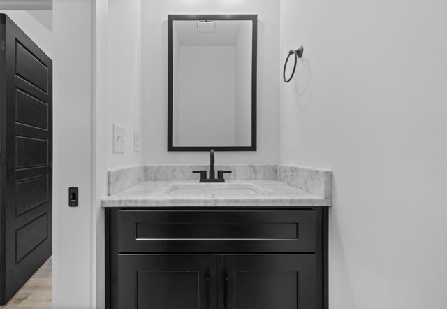 4410 Shiloh Canaan Rd, Palmyra, TN 37142 - bathroom featuring vanity and wood finished floors