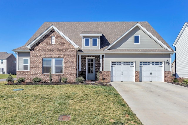 craftsman inspired home featuring brick siding, a front lawn, an attached garage, and driveway