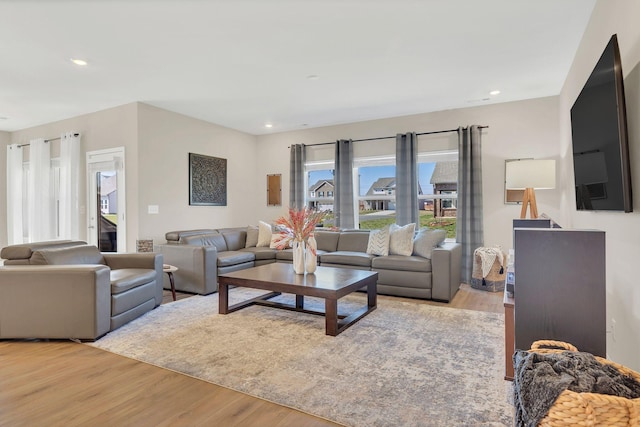 living room featuring recessed lighting and light wood-type flooring