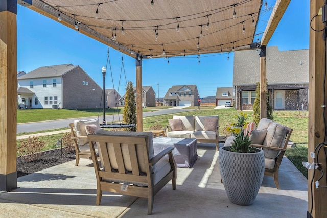 view of patio with a residential view and an outdoor hangout area