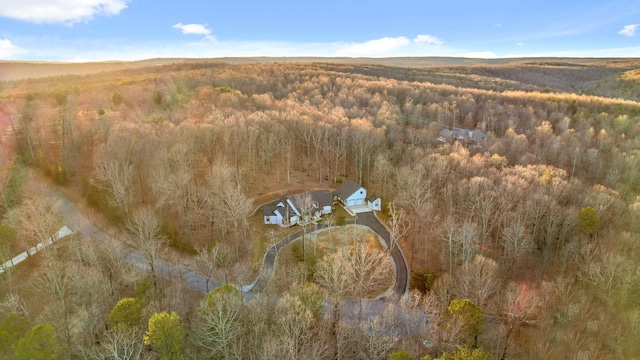 aerial view featuring a view of trees