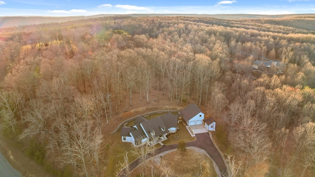 bird's eye view featuring a view of trees