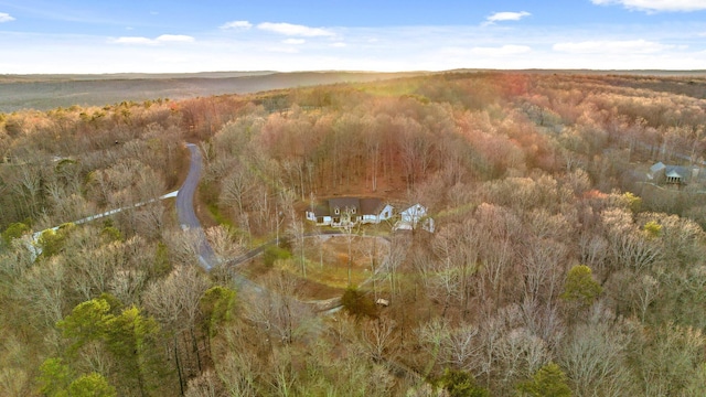 bird's eye view featuring a view of trees